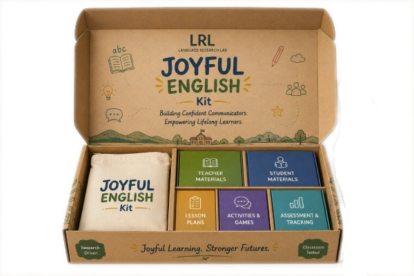 The Joyful English Kit box, open to show teacher materials, student materials, lesson plans, activities and assessment tools